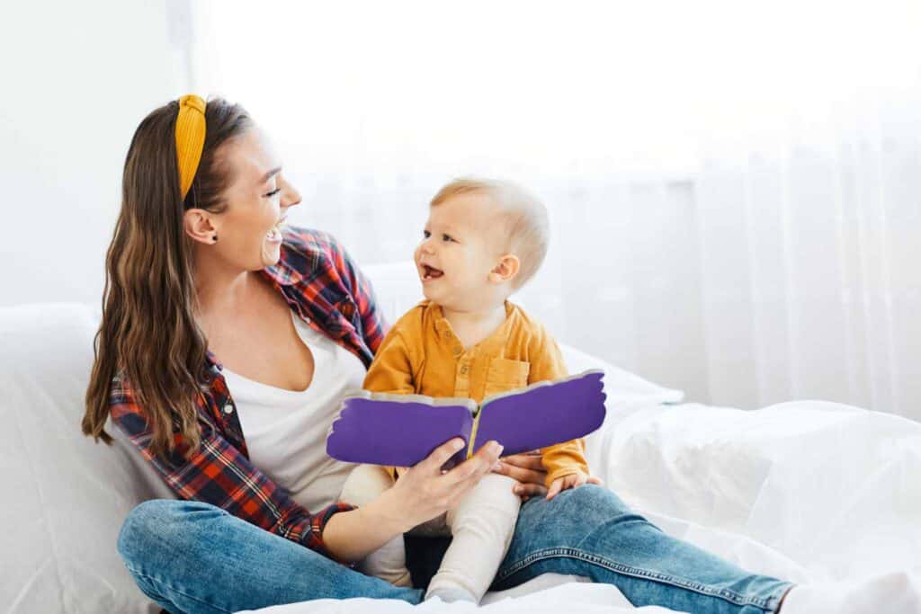 Mom and baby reading book