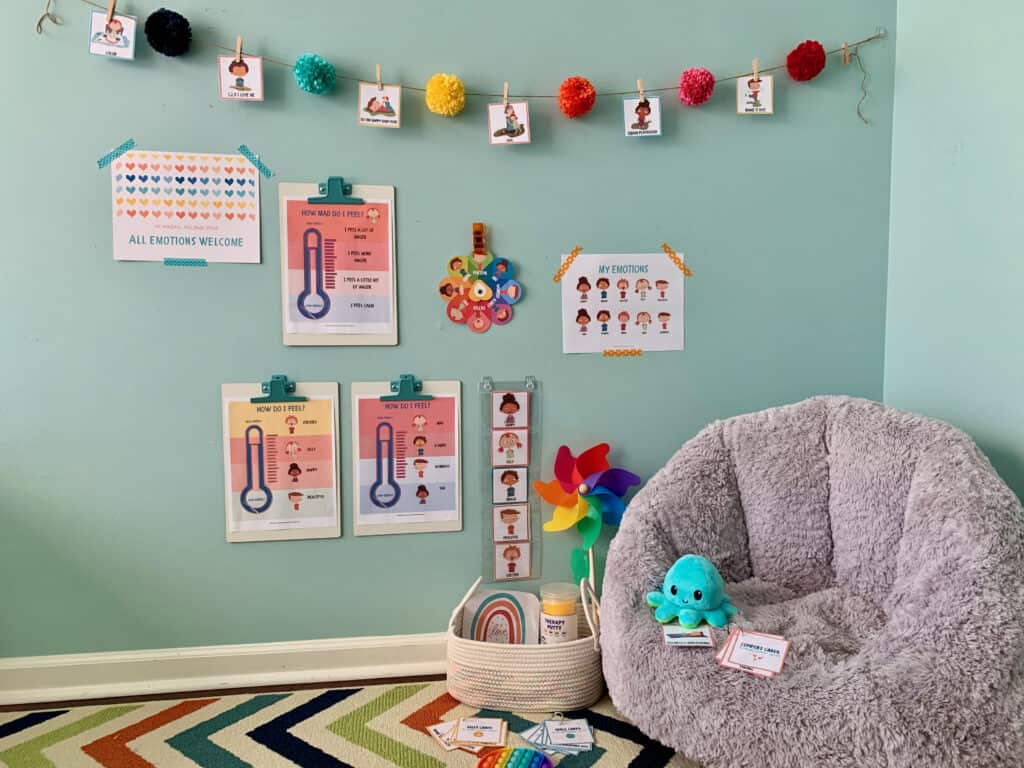 colorful and bright calm down corner for kids with emotions thermometer, poster, spinner, and regulation cards. 